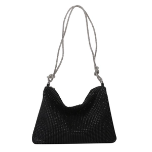 Chic black sequin tote bag with silver chain strap and knotted detail for elegant women