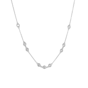 Detailed macro view of a 925 sterling silver chain with circular bezel-set cubic zirconia