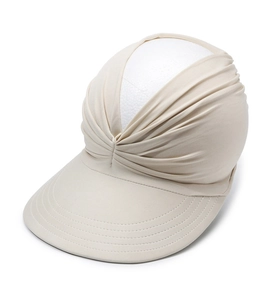 Detailed view of beige pleated sun visor with wide brim for outdoor UV protection