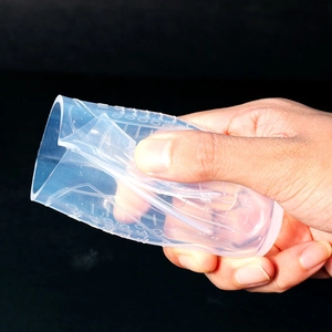 Flexible silicone measuring cup with clear molded scale markings for resin mold crafts