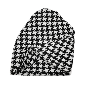 Classic black and white houndstooth knit beanie hat for winter outdoor warmth