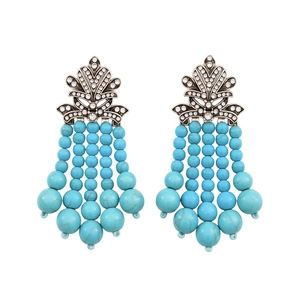 Boucles d'oreilles bohèmes en forme de feuille avec cristaux et pompons de perles turquoise