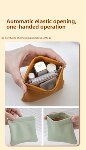 Detail of self-closing makeup bag showing the squeeze metal spring opening mechanism