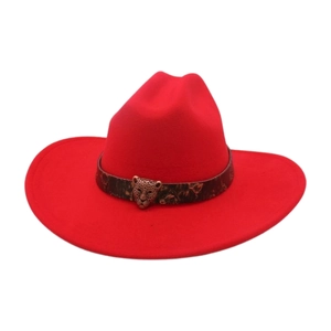 Detail of red wide-brim felt cowboy hat with bronze leopard head and vintage belt