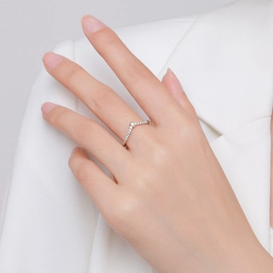 Elegant S925 sterling silver V-shaped ring with micro-pave zircons worn on model finger