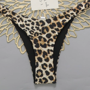 Macro shot of leopard print bikini bottom with high cut design and polyamide lining