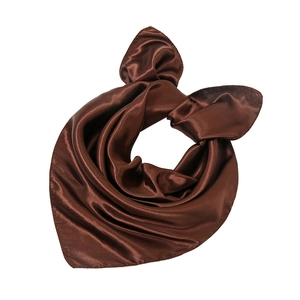 Detailed view of the dark brown satin fabric texture and glossy finish of the small square scarf