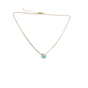 Detail shot of the golden box chain with adjustable lobster clasp and blue butterfly pendant