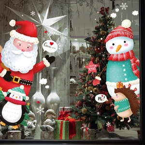 Christmas Santa window stickers with snowman and penguin decals for festive glass decoration