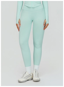 Detail of high-waist yoga set with thumbhole sleeves and ribbed stretch fabric