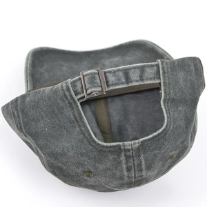 Detail view of washed dark gray cotton baseball cap with vintage metal buckle adjustment