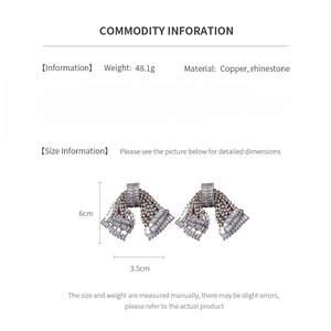 Detailed spec sheet showing 6cm x 3.5cm silver bow tassel earrings in copper and rhinestone