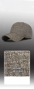 Detailed close-up of dark grey woven fabric texture on a structured baseball cap