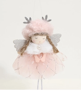 Close-up of plush angel ornament with pink fur hat, silver antlers, and sparkling tulle skirt