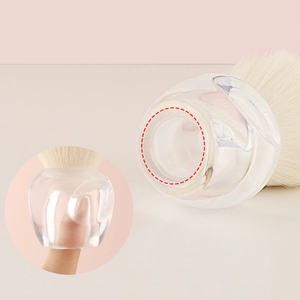 Transparent apple shaped makeup brush with high density white bristles and stable finger grip