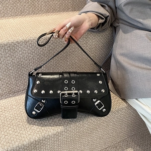 Punk style black PU leather shoulder bag with silver studs and Y2K rivet buckle details