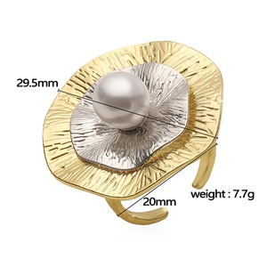 Elegant French-style gold and silver layered flower ring with a central white pearl