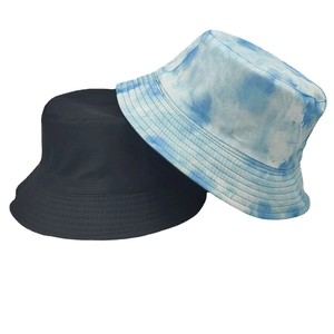 Reversible bucket hat in black and blue tie-dye cotton fabric for sun protection