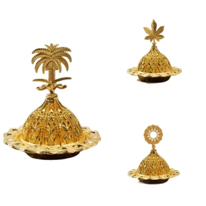 Three gold Arabian incense burners with ornate patterns and palm tree lids on white background