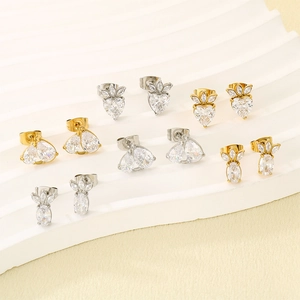 Sparkling zircon stud earrings set with heart and pineapple shapes in gold and silver