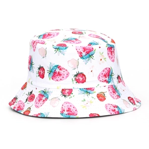 Detail of red strawberry digital print on white bucket hat with high quality stitching