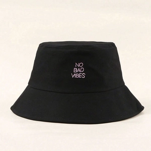 Black cotton bucket hat featuring pink NO BAD VIBES embroidery for casual sun protection