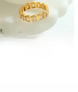 Detailed macro view of a gold-toned necklace featuring a hollowed round Double Happiness pendant