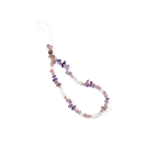 Detailed view of handmade phone charm featuring amethyst stones, pearls and gold beads