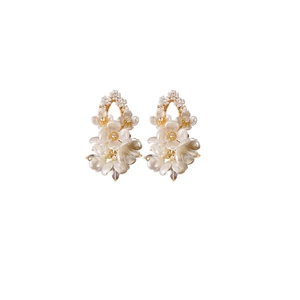 Elegant ivory floral earrings with acrylic petals and sparkling rhinestone centers