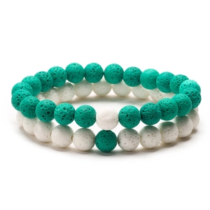 Minimalist volcanic stone couple bracelet set in mint green and white beaded design