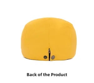 Back view of mustard yellow newsboy cap showing twill cotton texture and metal buttons