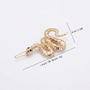 Gold snake shaped hair clip with mesh texture and black eyes 7cm length jewelry accessory