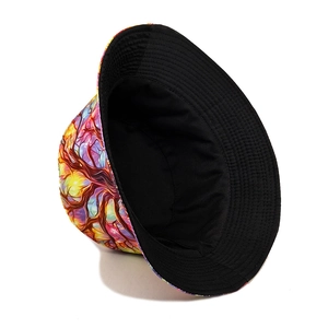 Colorful tree pattern bucket hat with artistic floral print and black lining