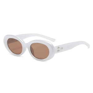 Close-up of retro oval white sunglasses featuring silver star studs on the temple