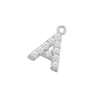 Polished silver 18K plated letter A pendant with inlaid white pearls on white background