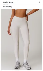 Detail view of high-waisted white gray yoga pants with ergonomic fit and matte finish