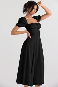 Detail view of square neck bubble sleeve midi dress with ruched bust and tie accents