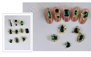 Detailed close-up of emerald gemstones and rhinestones for 3D luxury nail art decoration
