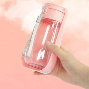 Portable pink folding pet water bottle for dogs with a lanyard and flip-top dispenser