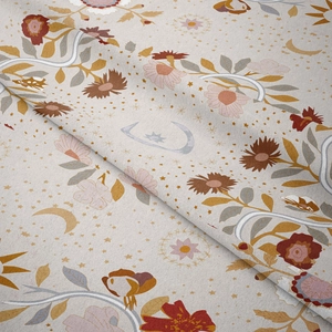 Detail of floral tapestry fabric with moon and star patterns on premium textured cotton linen