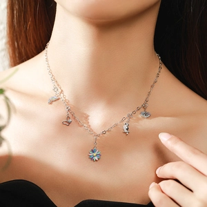925 Sterling Silver necklace featuring colorful bird, butterfly and rainbow charms