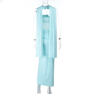 Detail of light blue slim maxi dress with sparkling texture and matching shawl wrap