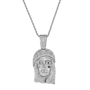 Detailed view of silver Jesus portrait pendant with shimmering crystals on twist chain