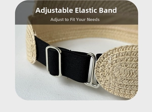 Detail of adjustable black elastic strap and silver metal buckle on straw sun hat