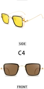 Detail view of retro square metal sunglasses in gold with yellow and tea lenses