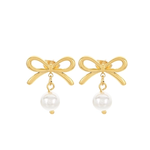 Elegant gold bow earrings with white pearl pendants, minimalist french style jewelry