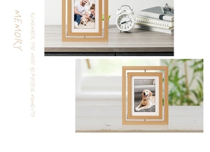 Close-up of rotating light wood double-sided photo frame with natural grain texture
