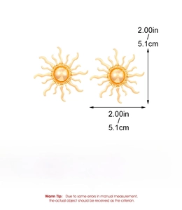 Detailed view of gold sun earrings featuring dimensions and scale measurements