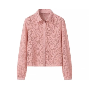 Detail of pink floral lace fabric on long sleeve polo collar shirt with buttons
