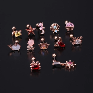Piercings d'oreille rose doré motif créatures marines avec zircons colorés